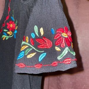 Black blouse with handmade details